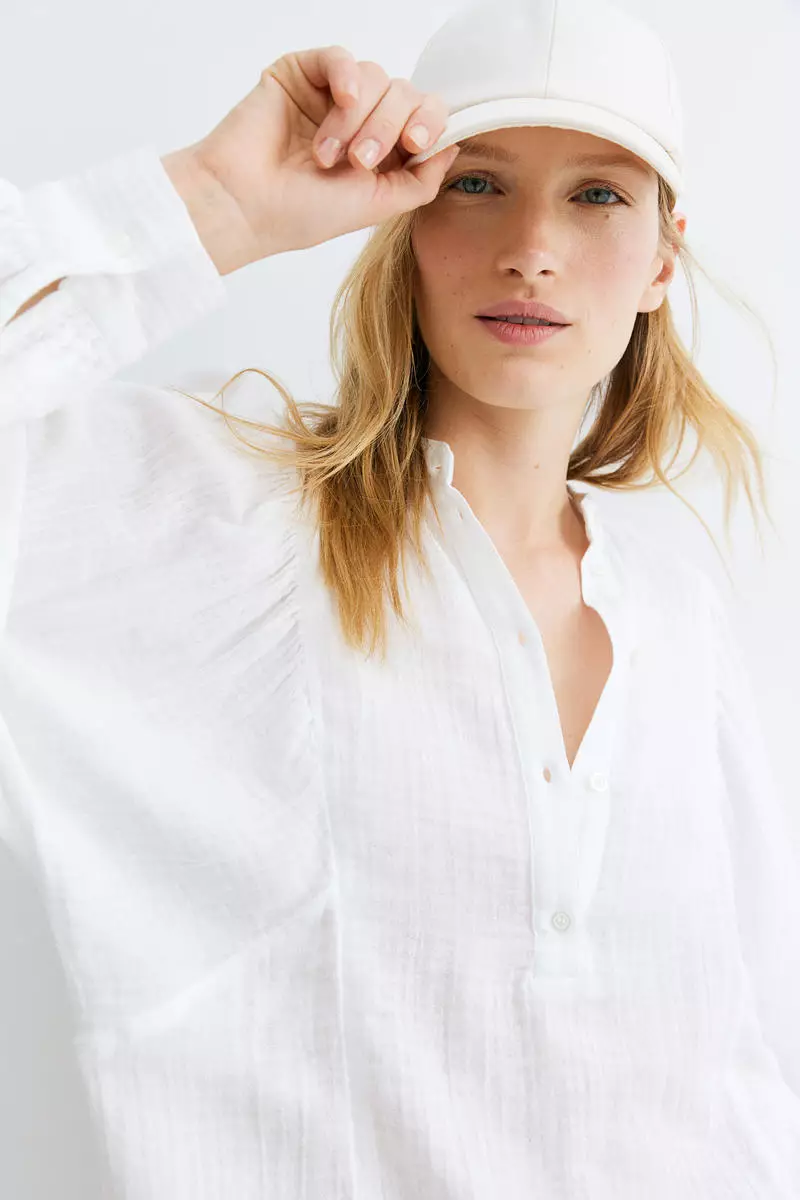 Batwing-sleeved muslin blouse