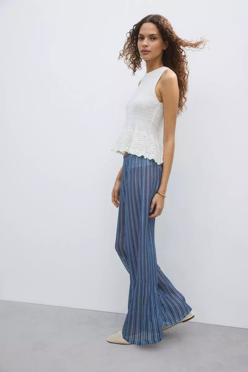 Wide hole-knit trousers