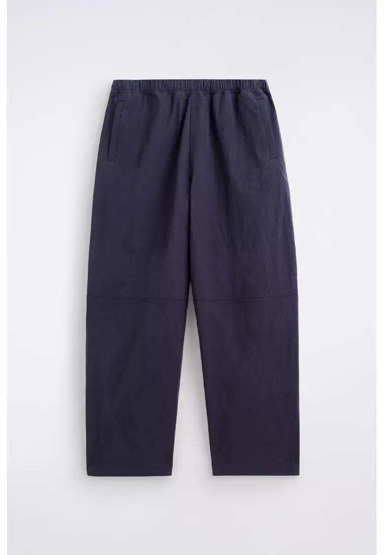 ELASTICATED RELAXED-FIT BARREL-LEG TROUSERS