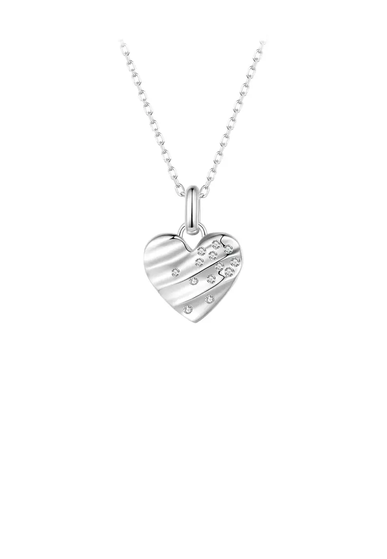 White gold store heart shaped locket