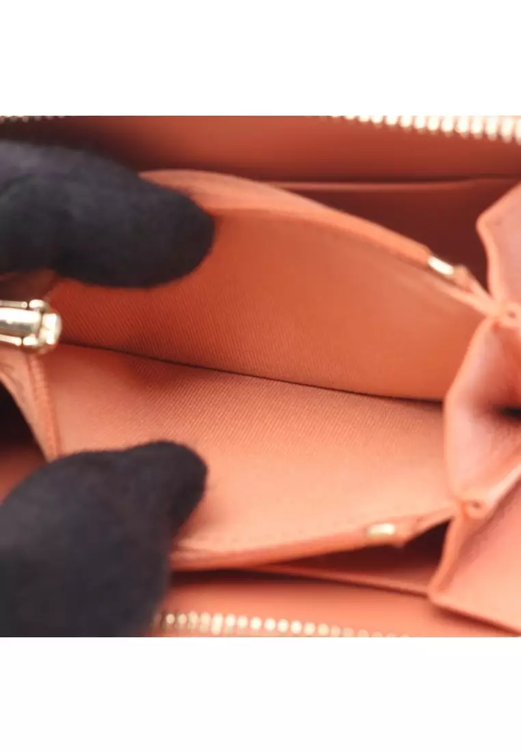 Pre-Loved Chanel matelasse coin purse lambskin pink beige gold hardware