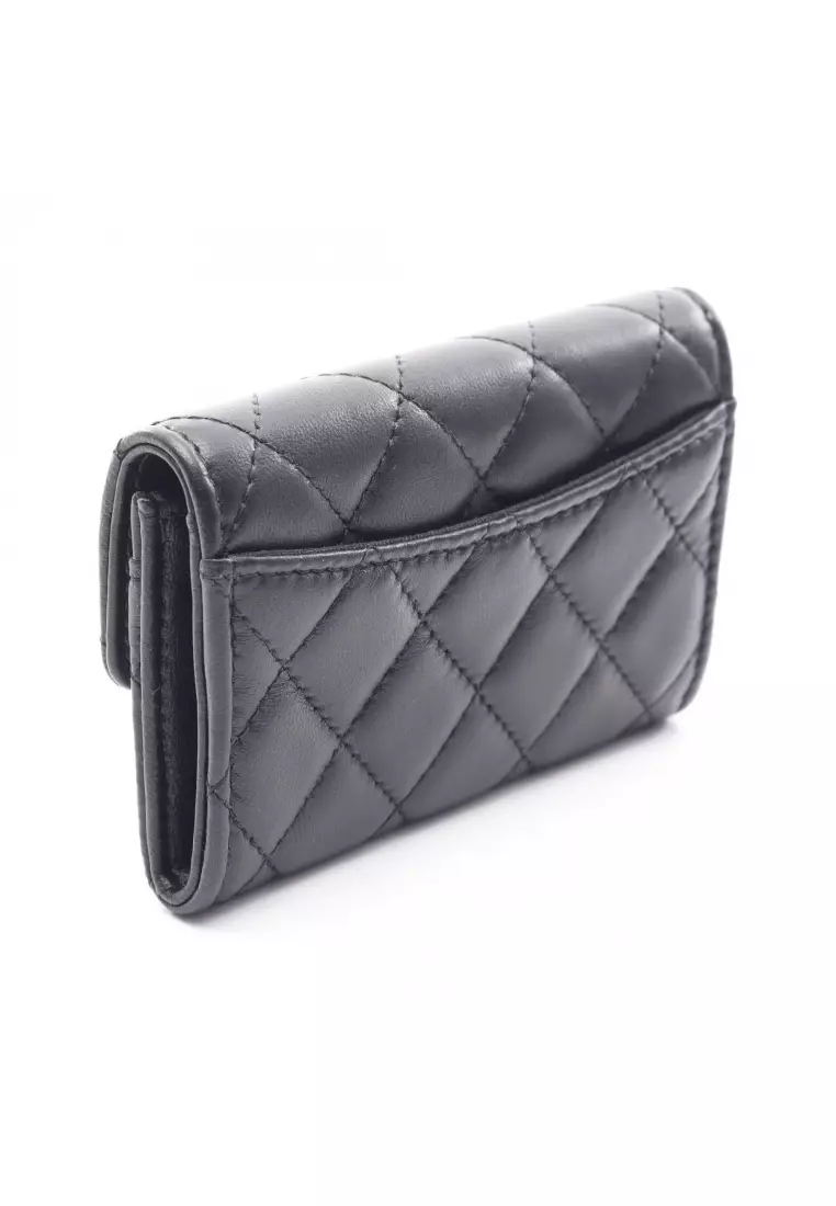 Pre-Loved Chanel matelasse card case lambskin black gold hardware