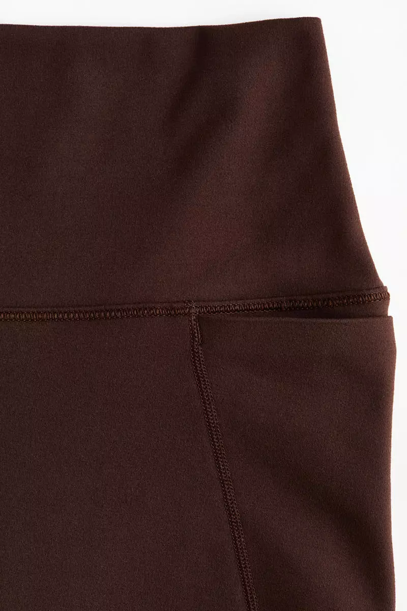 Pocket-detail sports leggings with SoftMove™