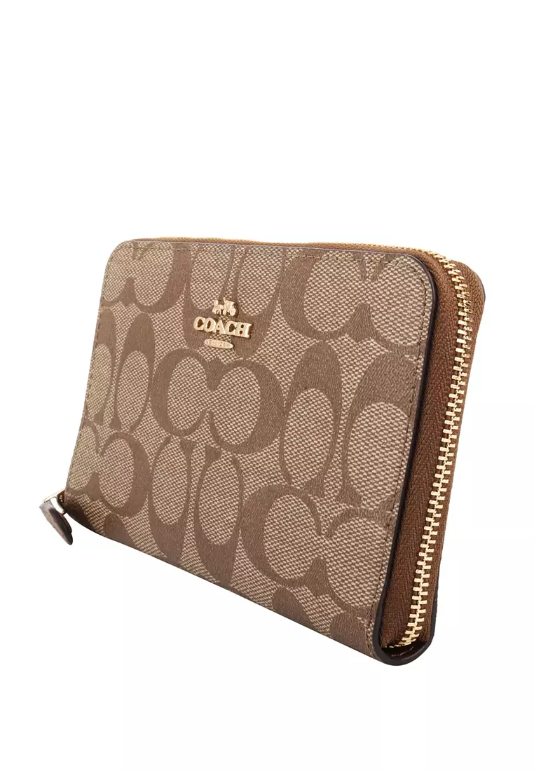 Coach Coach Medium ID Zip Wallet In Signature Canvas Brown 2024 Buy Coach Online ZALORA