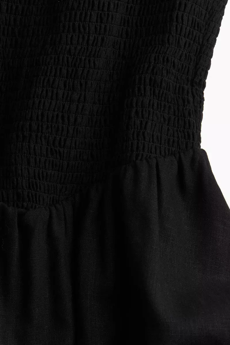 Tiered-skirt smocked dress