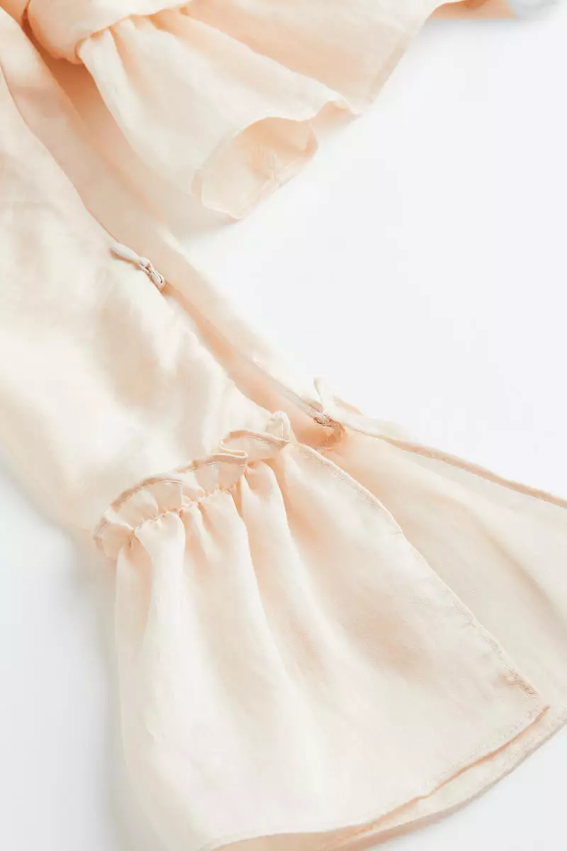 Puff-sleeved cropped peplum blouse