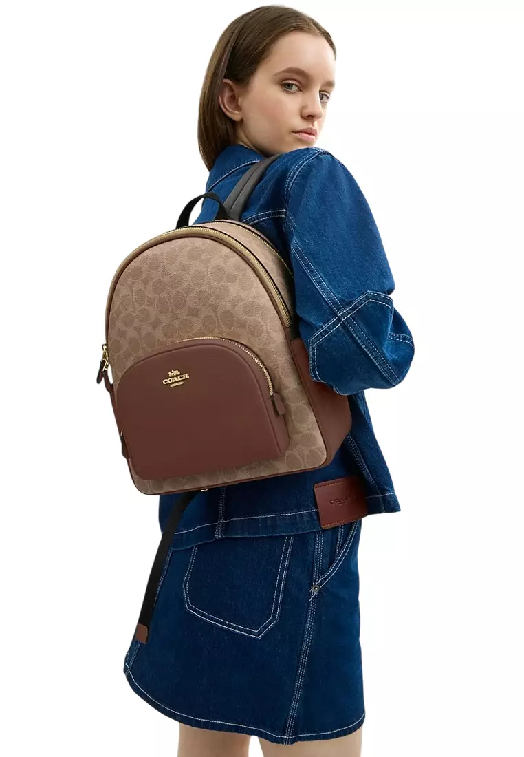 coach backpack tan and brown Crafted of Signature coated canvas and refined pebble leather this everyday backpack for women features a roomy interior double zip closure and an outside zip pocket COACH Tabby Backpack with Quilting