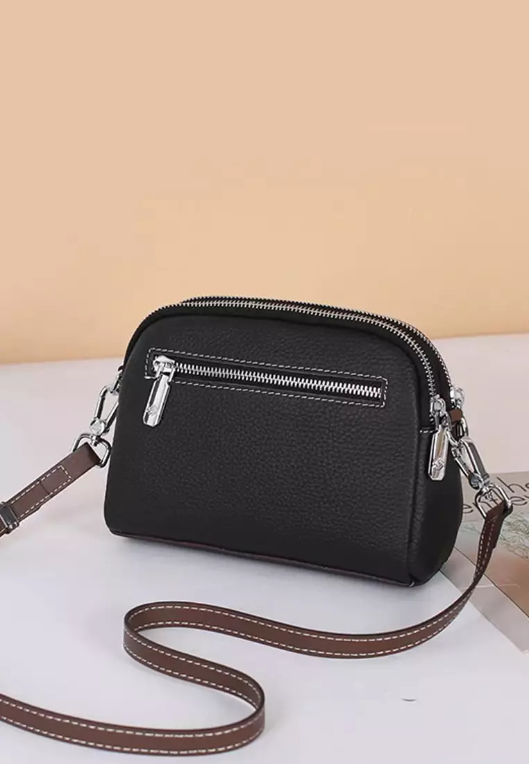 Litchi pattern head layer cowhide shoulder oblique backpack