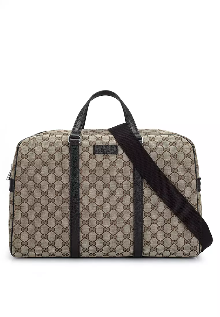 Gucci duffel best sale bags