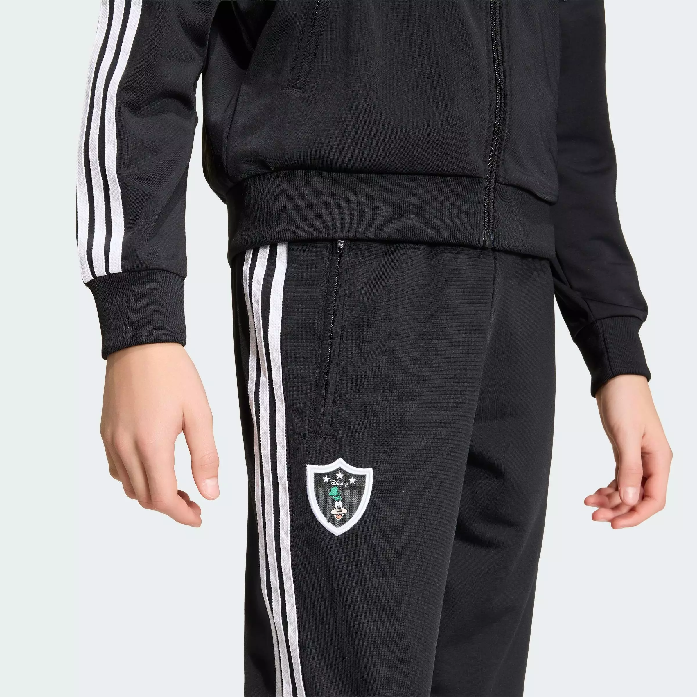 Lifestyle DISNEY FIREBIRD TRACKPANTS Unisex Black KC8441