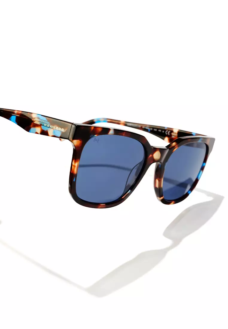 HAWKERS Teal Carey Blue TRIBE Sunglasses for Men and Women, Unisex. UV400 Protection. Official Product designed in Spain
