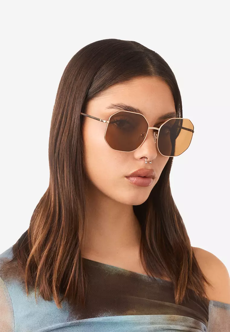 HAWKERS Rose Gold Earth Lumina Sunglasses For Women, Female. Official Product Designed In Spain