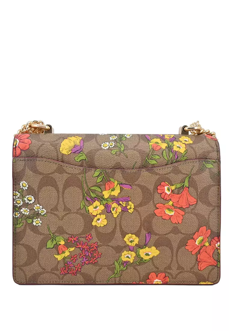 Klare Crossbody Bag In Signature Canvas With Floral Print - Brown/Multi