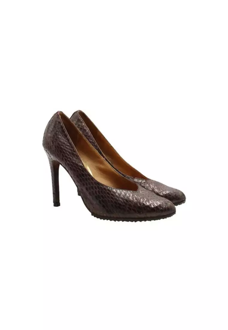 Coach best sale snakeskin pumps