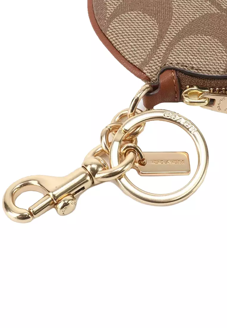 Circular coin pouch bag charm in signature canvas best sale