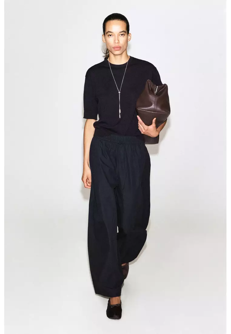 ELASTICATED BARREL-LEG TROUSERS