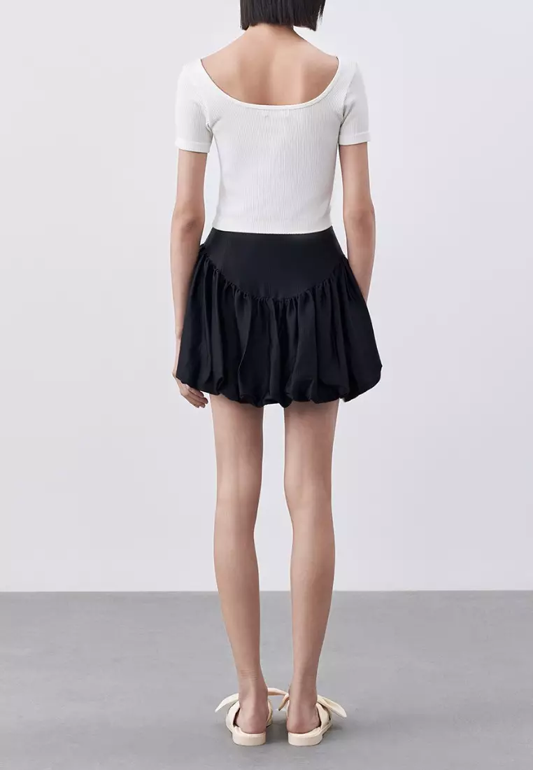 A line ruffle outlet skirt