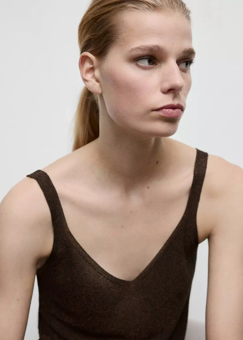 Atasan rajut lurex kerah V