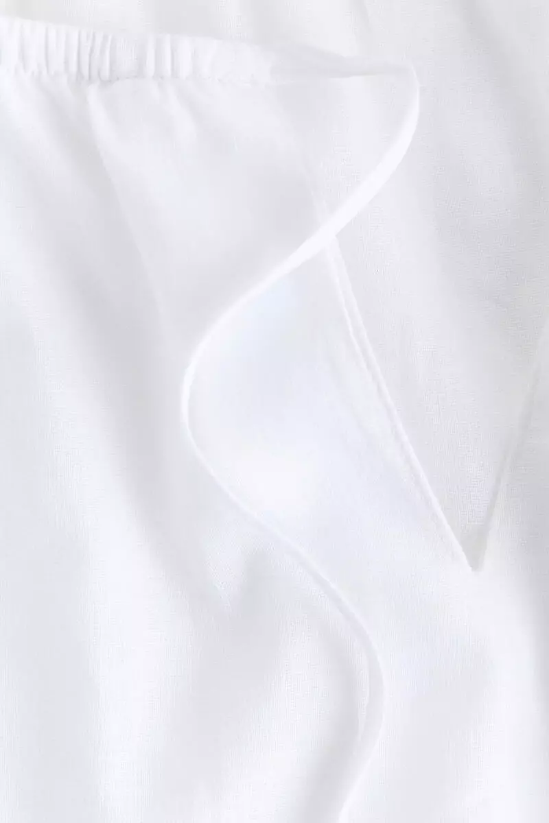 Puff-sleeved linen-blend blouse