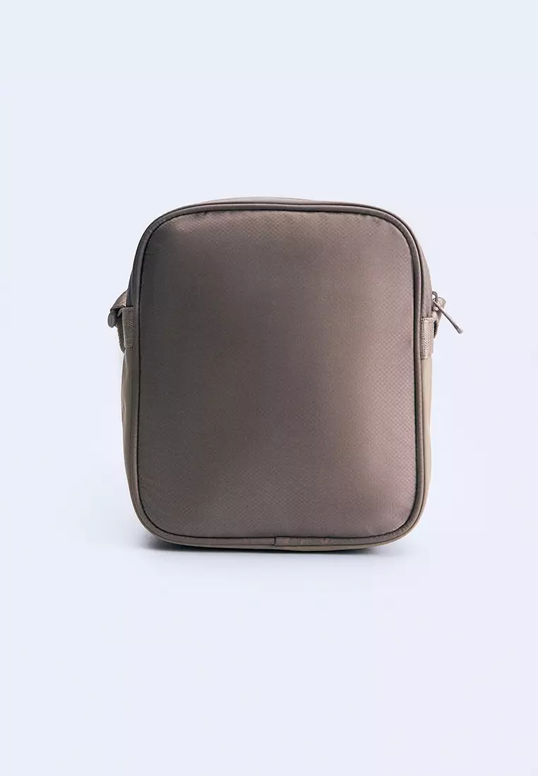 Multi Compartment Sling Bag