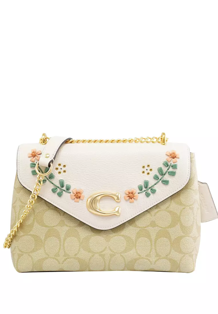 Coach signature floral discount crossbody