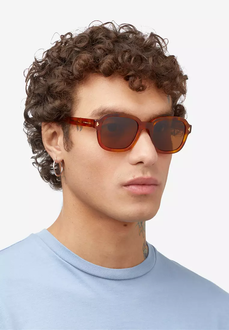 HAWKERS Carey Caramel TWIST Sunglasses for Men and Women, Unisex. UV400 Protection. Official Product designed in Spain
