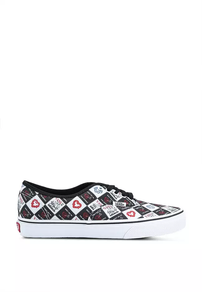 Black vans with white letters