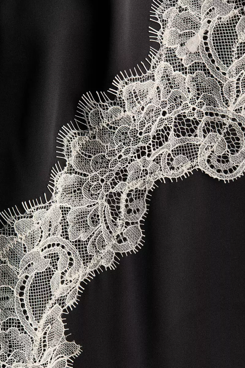 Lace-trimmed asymmetric nightslip