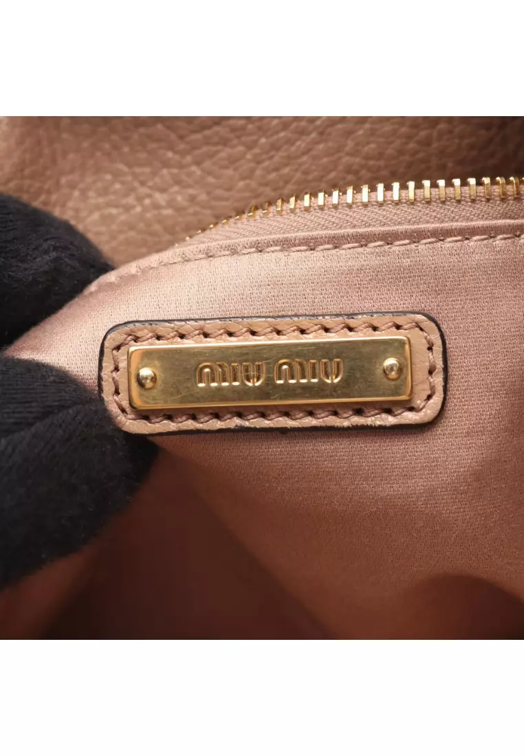 Pre-Loved MIU MIU Handbag leather pink beige 2WAY drawstring
