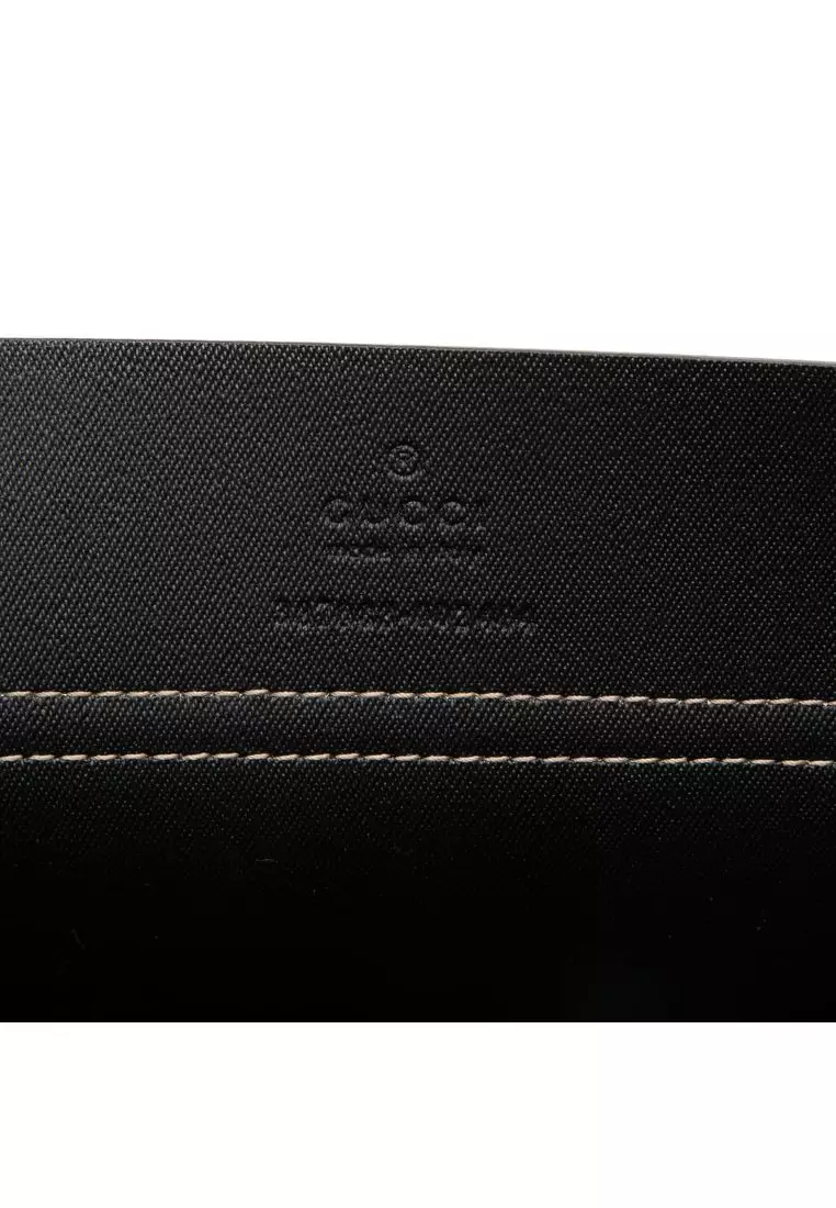 Pre-Loved Gucci Large Gg Supreme Clutch