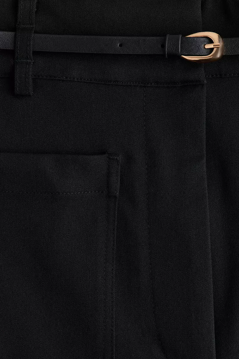 Flared belted trousers