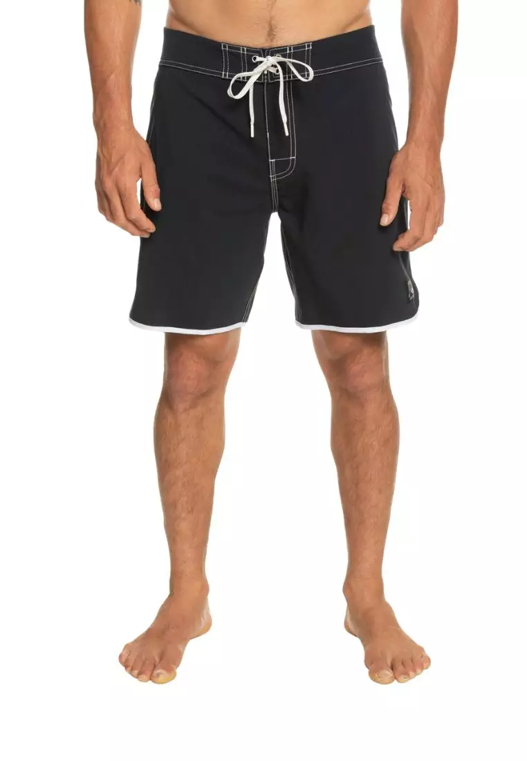 Men on sale in boardshorts