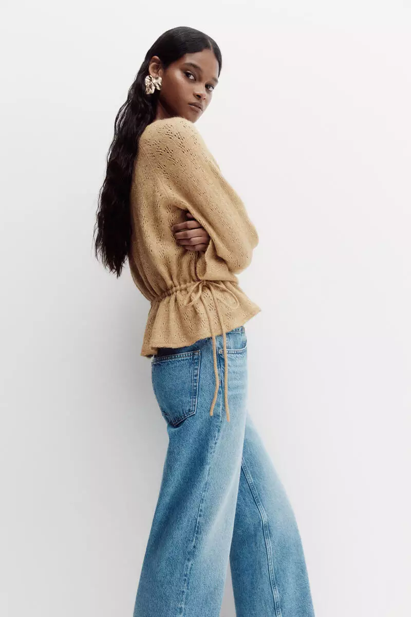 Pointelle-knit peplum top