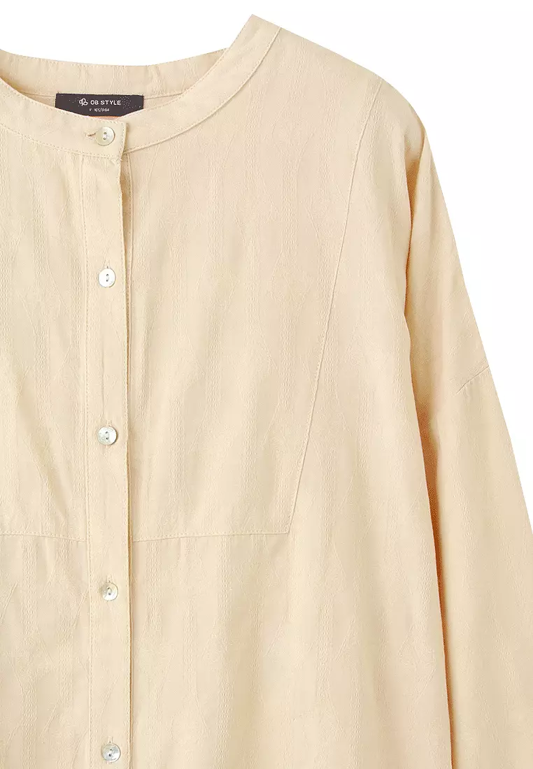 立體織紋中山領前短後長貝殼排扣寬鬆襯衫《AB19254》
