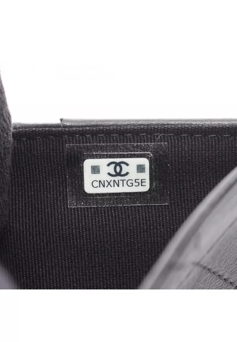 Pre-Loved Chanel matelasse Bi-fold wallet leather black silver hardware