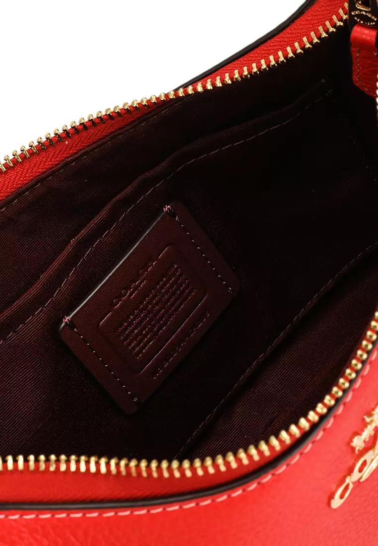 Coach red sling bag best sale