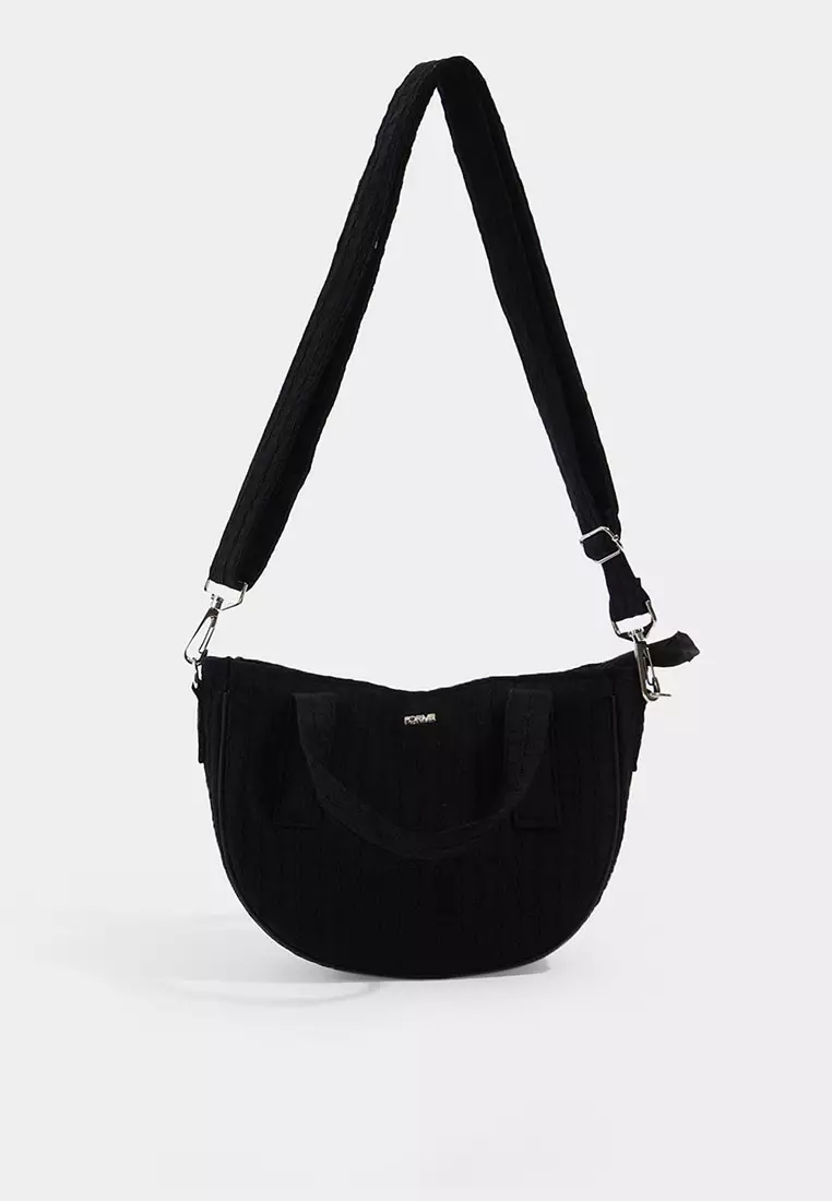 Textured sling bag deals
