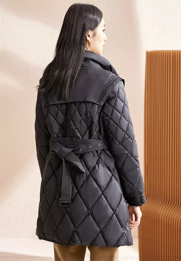 Down coat with belt outlet