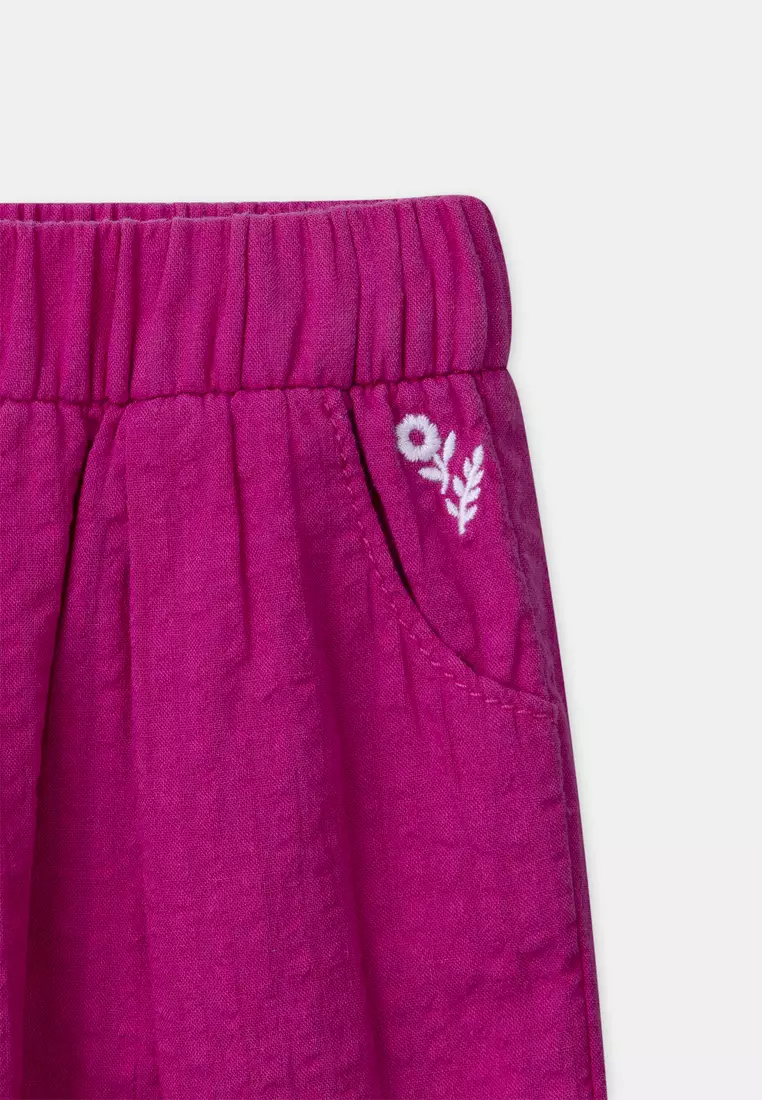 Fuchsia pink shorts with floral embroidery
