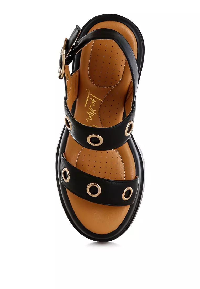 Sandal Platform Bertumit Detail Lubang Tali Warna Hitam