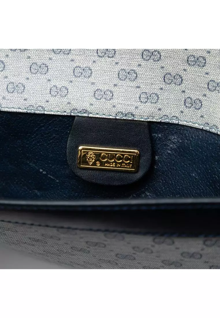 Pre-Loved Gucci Micro Gg Supreme Clutch