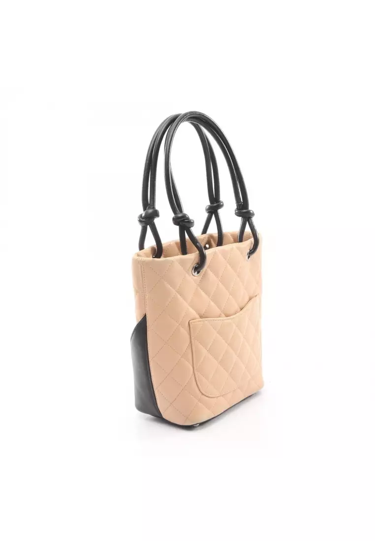 Pre-Loved Chanel Cambon line Small Handbag tote bag leather beige black silver hardware