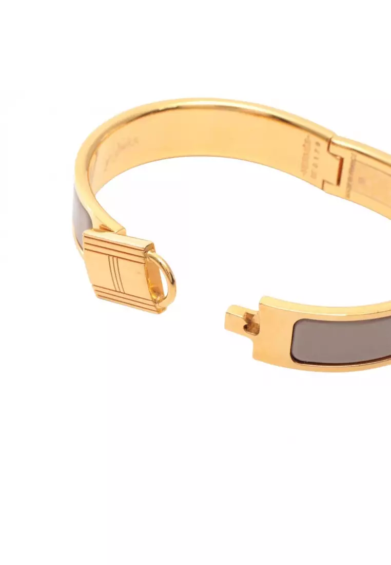 Pre-Loved Hermès Click Cadena PM bangle GP gold beige