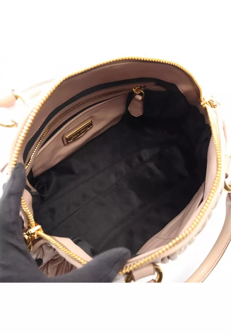 Pre-Loved MIU MIU matelasse 2WAY Handbag leather pink beige