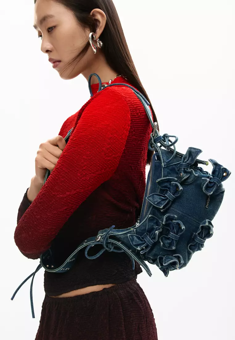 Denim bag with appliqués