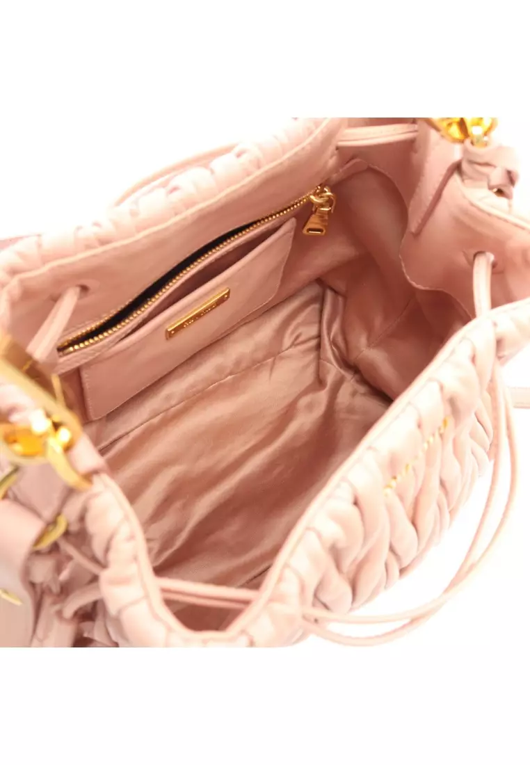 Pre-Loved MIU MIU matelasse 2WAY Handbag leather pink beige
