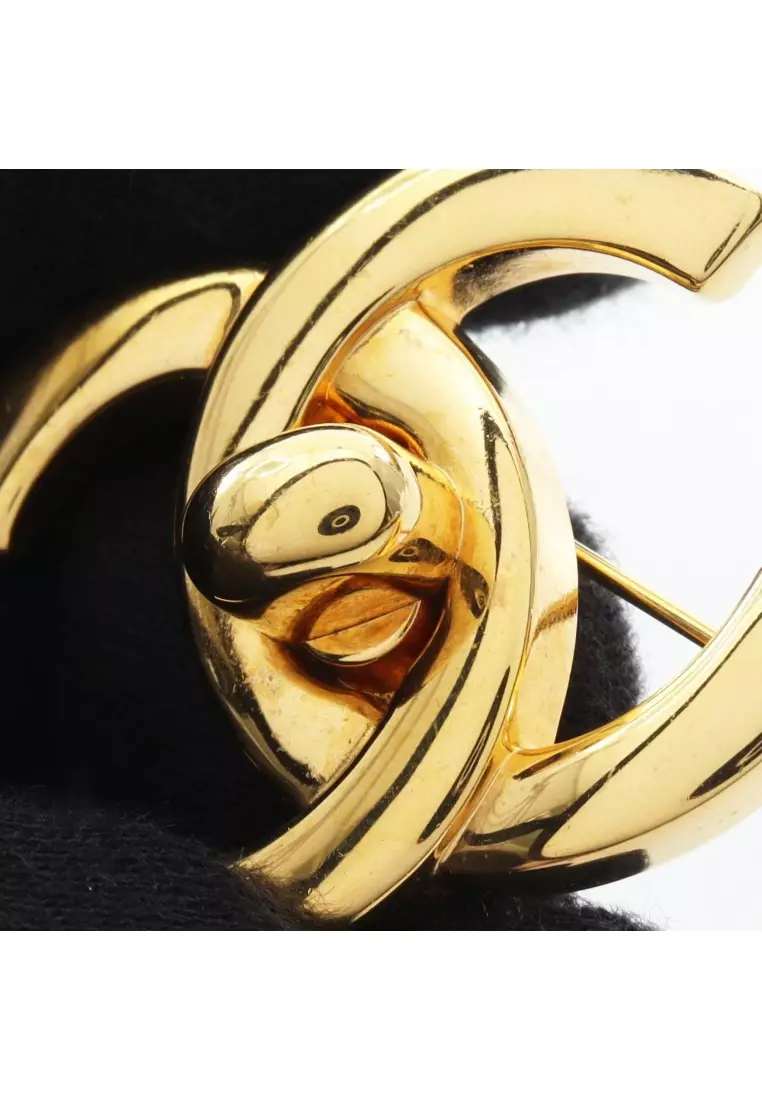 Pre-Loved Chanel coco mark brooch GP gold 96P
