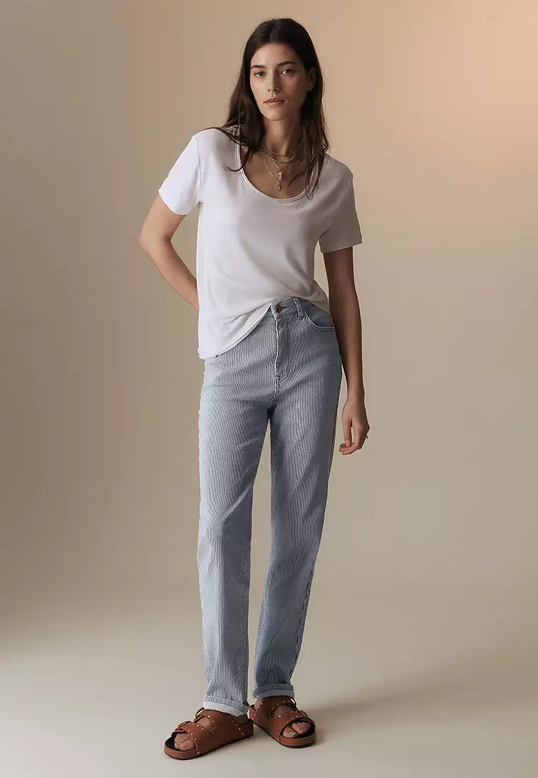 Girlfriend High Waisted Tapered Jeans