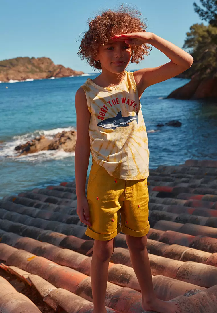 MUSTARD SHORTS WITH MULTICOLOURED SHARK FIN EMBROIDERIES