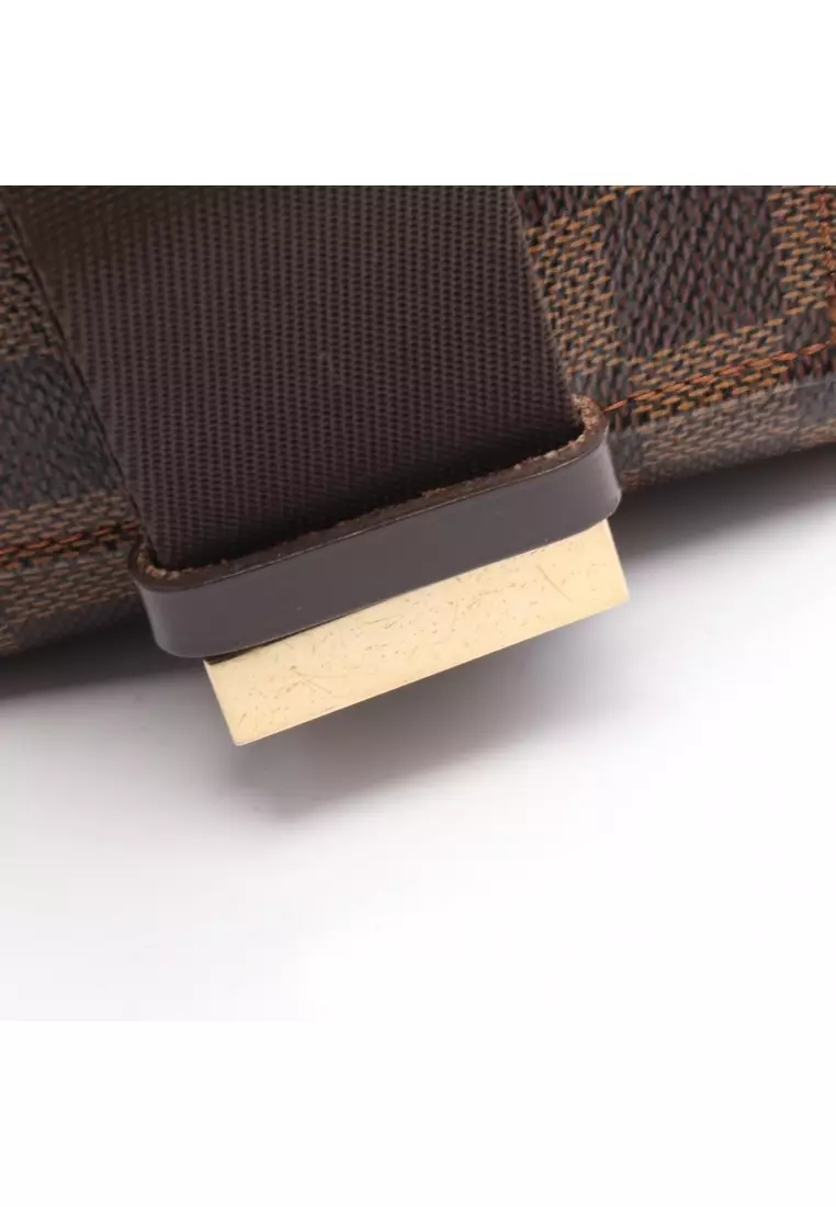 Pre-Loved Louis Vuitton Geronimos Damier  ebene body bag PVC Brown